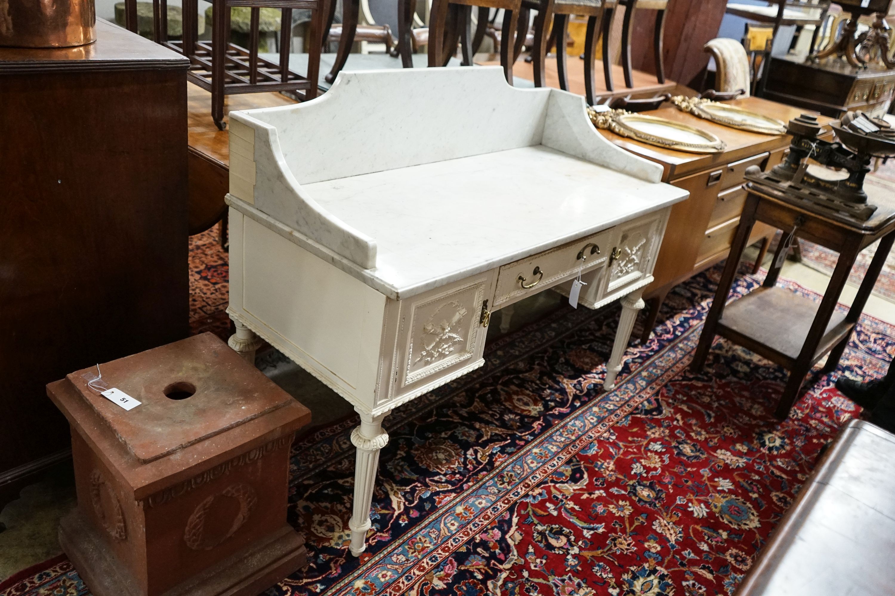 An Edwardian painted pine and gesso marble topped wash stand, width 122cm, depth 56cm, height 90cm